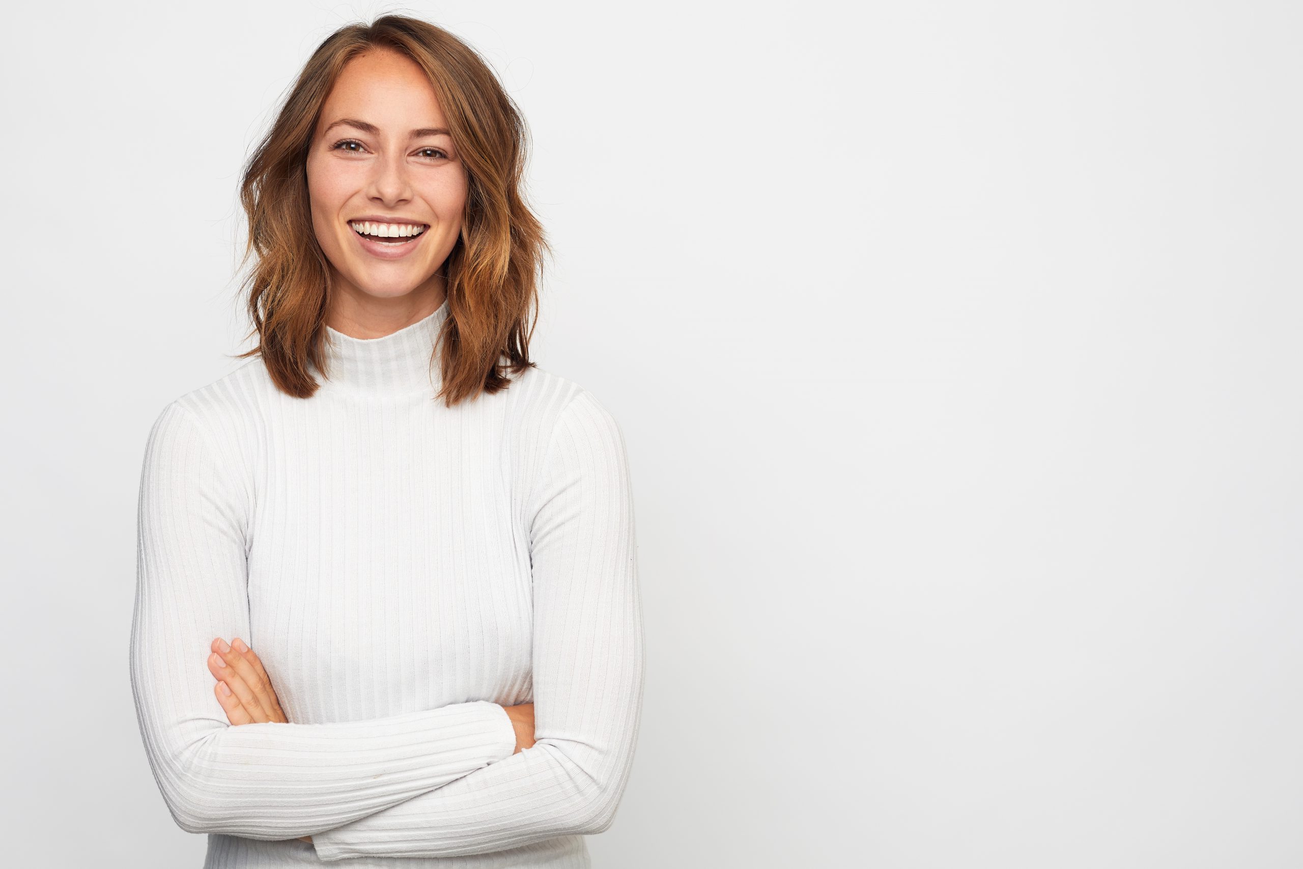 portrait of young happy woman looks in camera